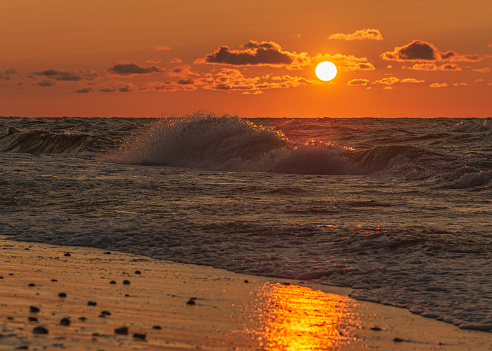 Sunset over the Baltic beach in Sarbinowo (West Pomeranian Voivodeship).