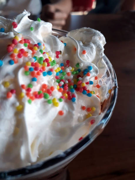 istock Frothed milkshake with colored candies 1371748775