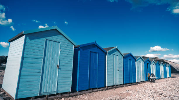 istock Beach huts in warm sunshine 1371749319