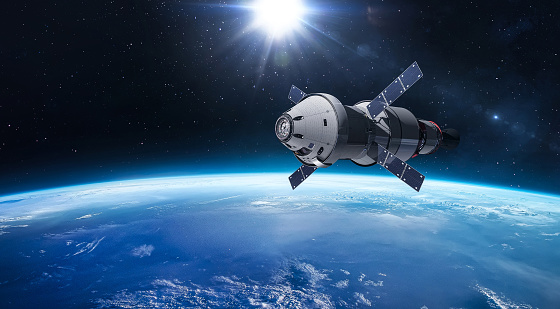 Spacecraft Orion on orbit of Earth planet. Spaceship in space. Expedition to Moon. Artemis program. Elements of this image furnished by NASA (url: https://www.nasa.gov/sites/default/files/styles/full_width_feature/public/thumbnails/image/iss060e007297.jpg https://www.nasa.gov/sites/default/files/styles/image_card_4x3_ratio/public/images/719829main_Orion_Arrays_02_full.jpg)