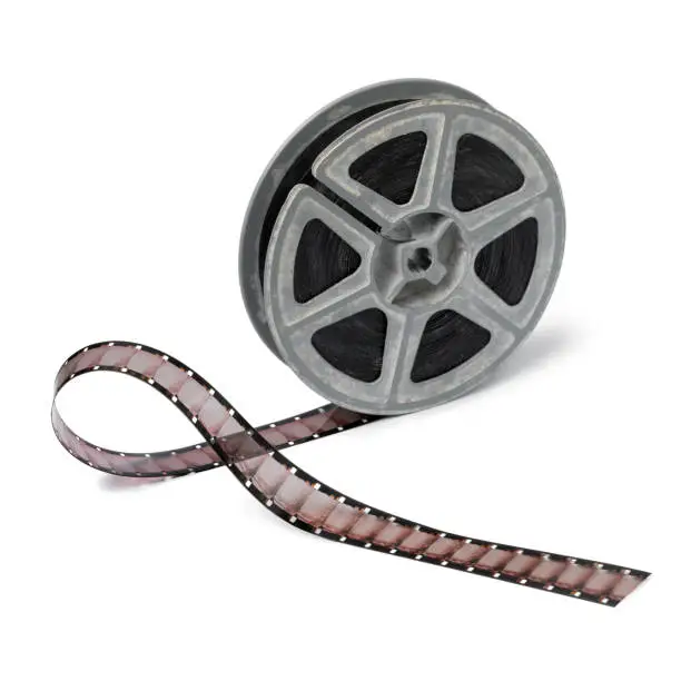 Vintage 16mm film reel and film on white background isolated on white background