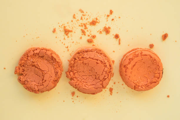istock Top View Of Crushed Macarons On Yellow 1371758198