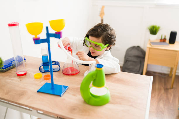 istock Cute child dreaming of being a scientist 1371759359
