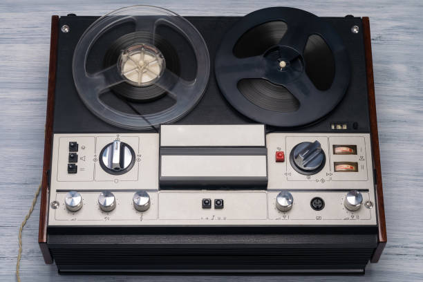 istock old magnetic tape recorder on a gray table background 1371761288