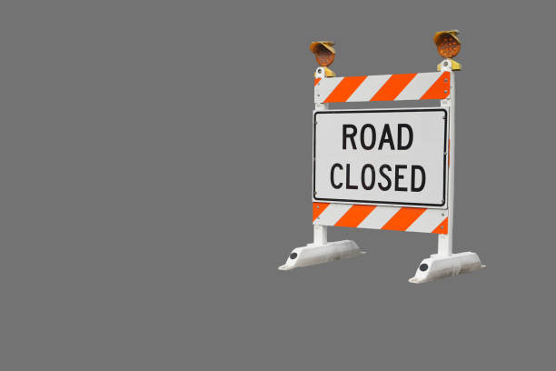 istock Road closed sign isolated on gray background 1371764823