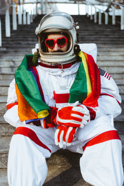 istock lgbt spaceman in a futuristic station 1371765264