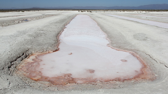 Crystallizing ponds at salt farming in a coastal desert, Punta Arena de La Ventana, Baja California Sur, Mexico