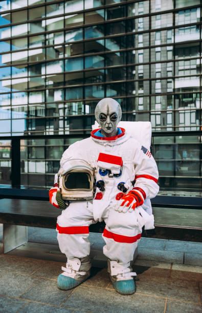 istock alien spaceman in a futuristic station 1371765764