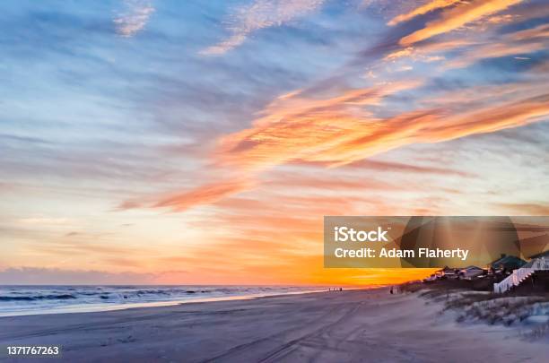 Dusk Beach Scene At Emerald Isle North Carolina Crystal Coast Bogue Banks Waves And Clouds Orange Blue Stock Photo - Download Image Now