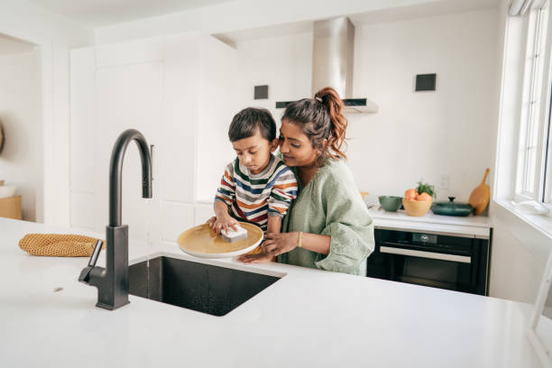istock Mom teaching a kid about sustainable living. 1371767819