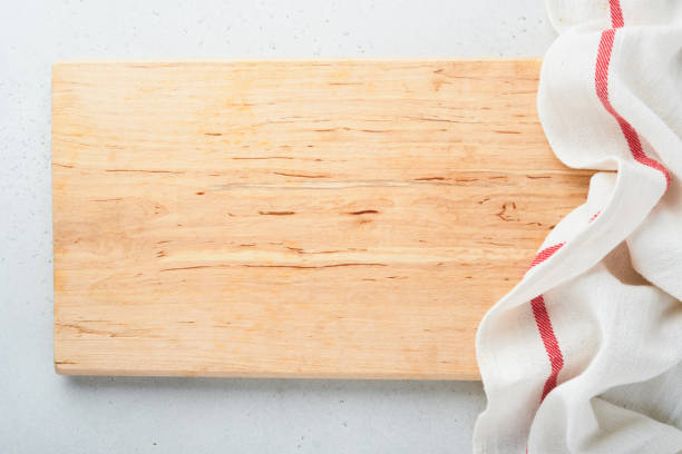 istock Baking ingredients and kitchen utensils on a white background top view. Preparing heart sugar cookies. Baking background. Flour, eggs, sugar, spices, and a whisk on the kitchen table. Flat lay. 1371768410