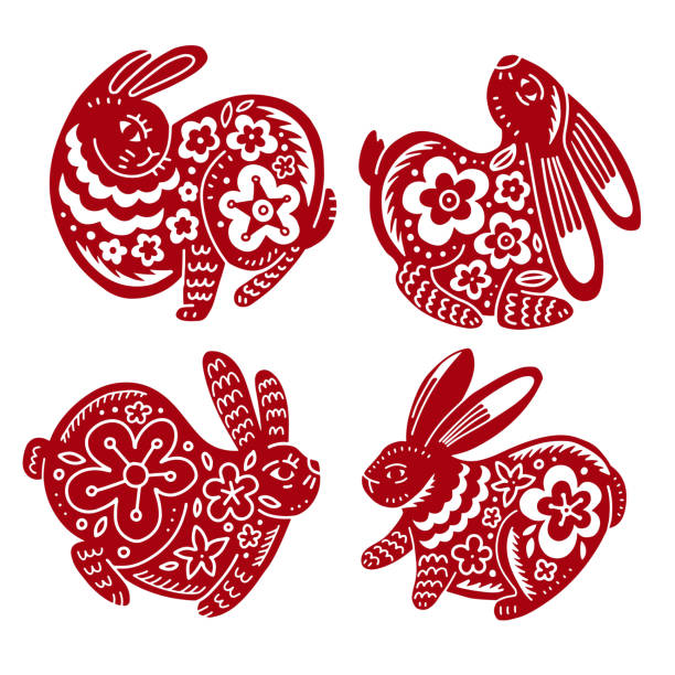 istock 4 red Hares - Chinese zodiac symbol. Set of rabbits in different variations. Silhouettes drawn in chinese style with floral ornate in graphic style. Vector hand darwn illustration. 1371773569