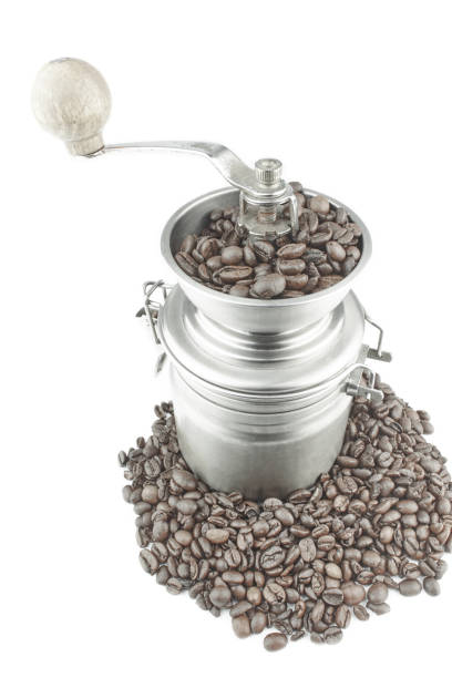 istock Old Coffee Grinder with Coffee beans, isolated on white 1371776765