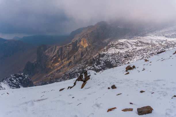 istock A Hiker trekking in the mountains 1371778101
