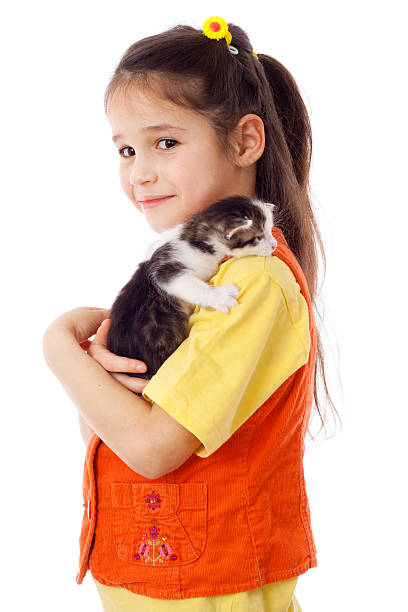 istock Little girl with kitty on shoulder 137177849