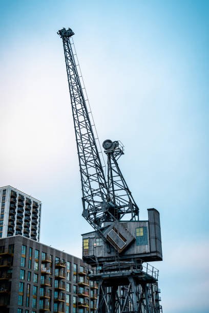 istock Tall cranes at Canary Wharf in London 1371783056