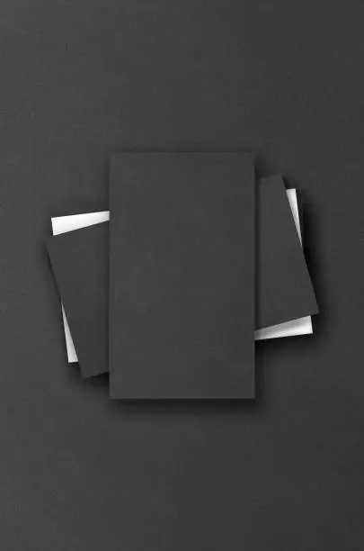 Photo of Black rectangular mockups on a dark background. Design elements or portfolio. Copy space