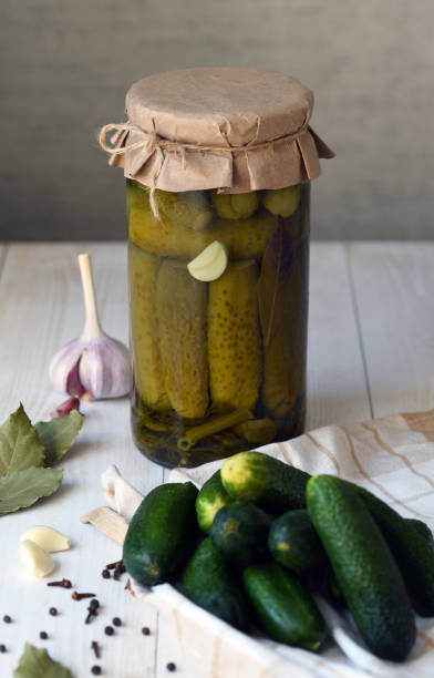 istock Canned cucumbers and pickle ingredients. 1371785299