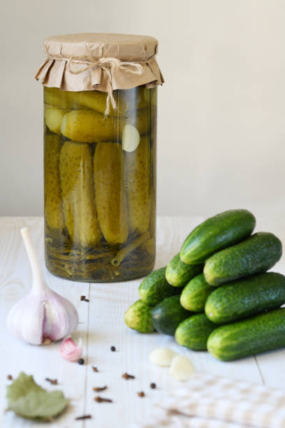 istock Canned cucumbers and pickle ingredients. 1371785316