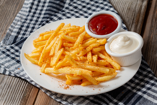 french fries, fast food, crispy french fries, french fries presentation, french fries on plate, ketchup, mayonnaise.
