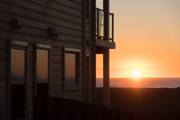 istock Glowing sunset behind  resort building in Westport 1371788498