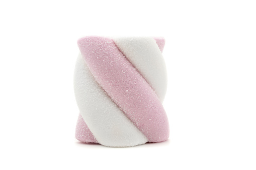 Close-up of One Marshmallow candy isolated on white background. Pink white candy.