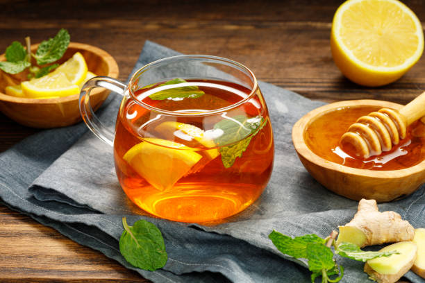 istock A glass cup of hot tea with lemon, mint and ginger. 1371790178
