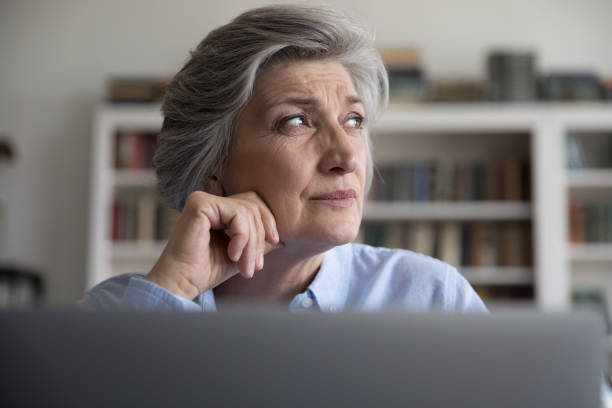 istock Head shot stressed middle aged businesswoman working on computer. 1371790388
