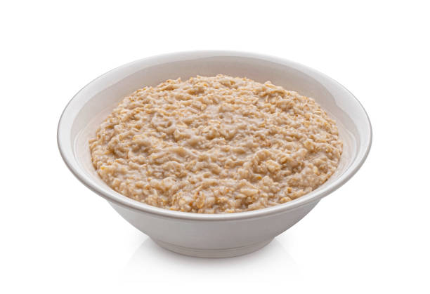 istock Bowl of oatmeal isolated on white background 1371790656