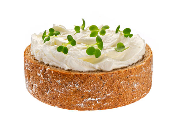 istock Rye toasted bread with cream cheese isolated on white background 1371792129