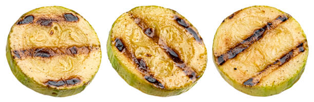 istock Grilled zucchini isolated on white background 1371792251