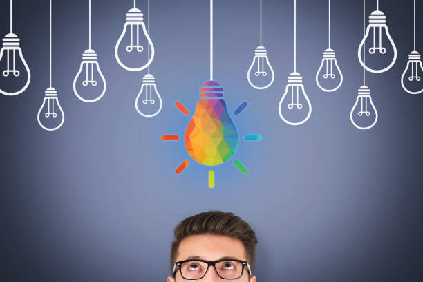 Creative idea concepts with light bulbs over human head on touch screen stock photo