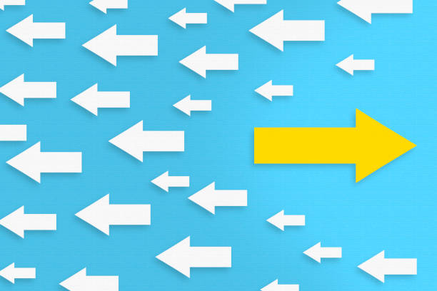 istock Going Your Own Way with Arrows Symbol on Blue Background 1371794385