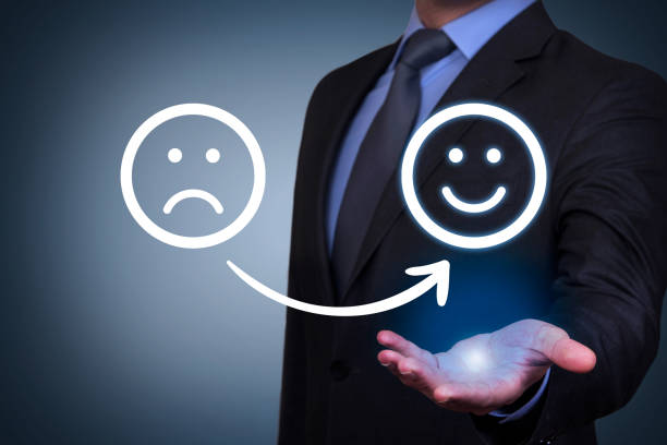 istock Unhappy and Happy over Human Hand on Touch Screen 1371794748