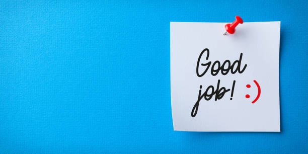 istock White Sticky Note With Good Job And Red Push Pin On Blue Background 1371796460