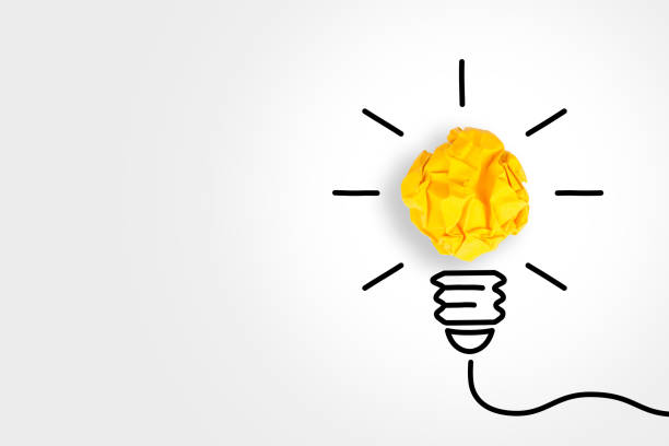 istock New Idea Concepts with Light Bulb Crumpled Paper on White Background 1371796602