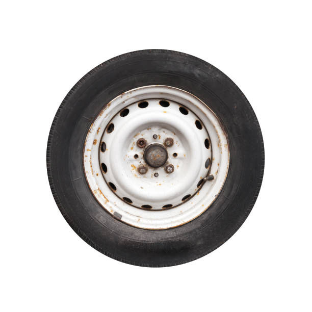 istock Used white car wheel isolated on white 1371797284