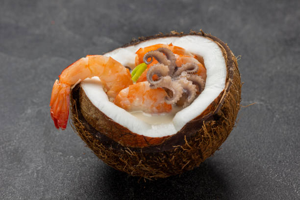 istock Seafood cream soup in coconut. Close up. 1371798181