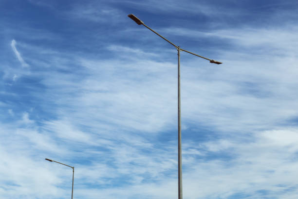 istock looking up at street lights against sky 1371799855