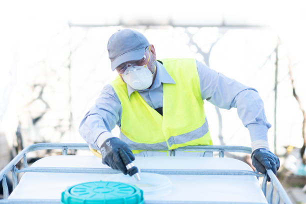 istock A worker cleans and prepares a container for storage and transfer of chemicals 1371801057