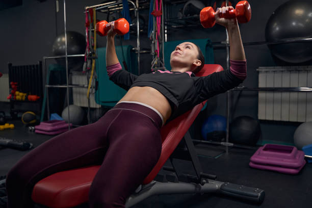 istock Positive delighted brunette woman doing physical training 1371802339