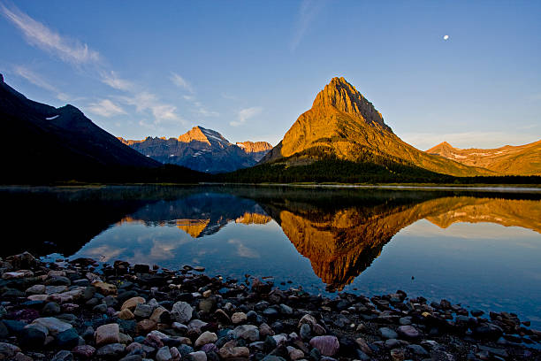 istock Sunrise over Swiftcurrent Lake 137180389