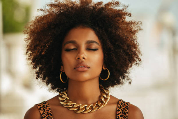 istock Pretty young afro woman 1371807196