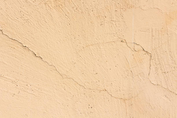 istock Beige sand color cracked horizontal background 1371812135