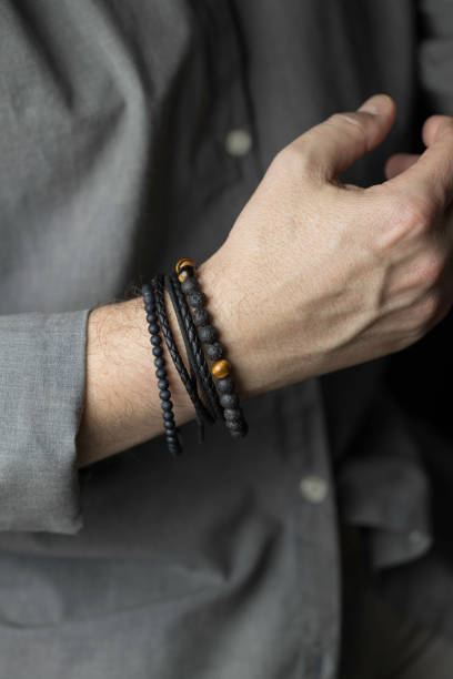 istock man with a stylish bracelet on his wrist 1371821011