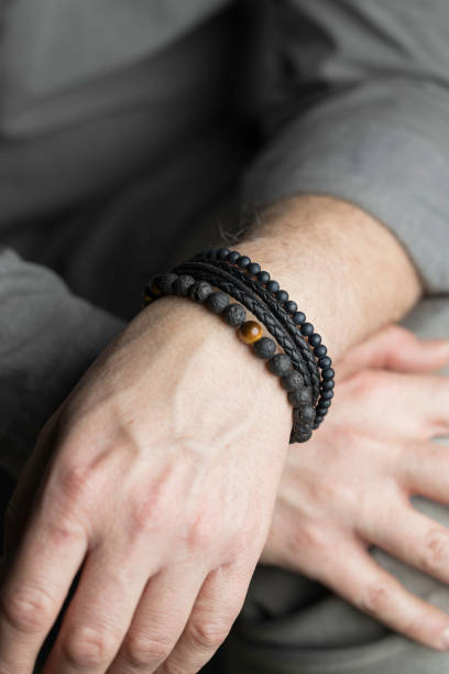 istock man with a stylish bracelet on his wrist 1371821015