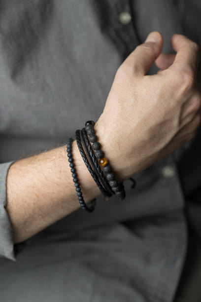 istock man with a stylish bracelet on his wrist 1371821017
