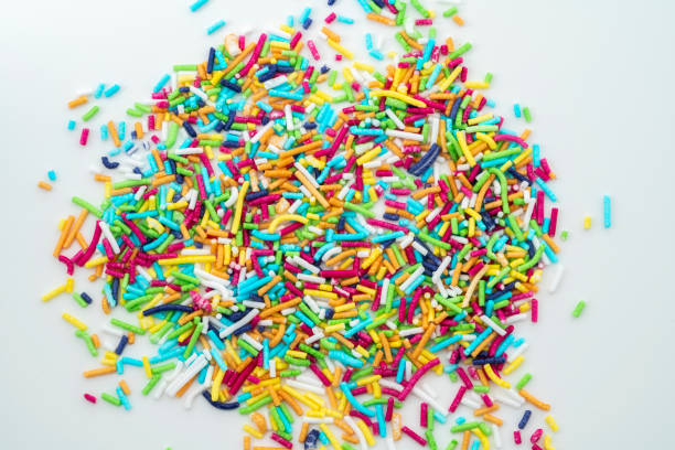 istock Sugar sprinkle decoration for cake, sprinkles background. 1371821986
