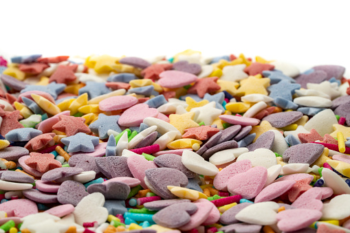 Heap of assorted tasty candy as confectionery background