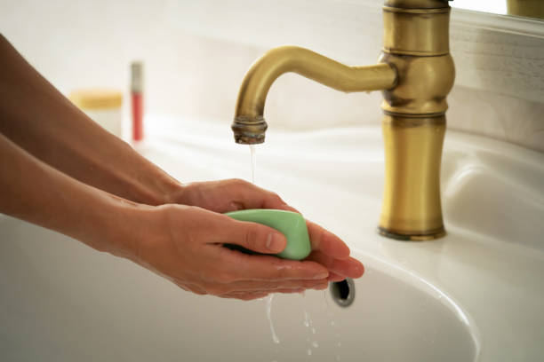 istock Woman is washing her hands. 1371824645